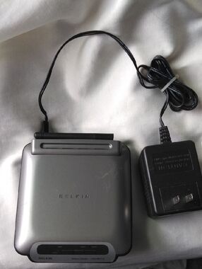 Belkin Silver and Black Wireless Router with Power Adapter